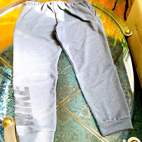 ✨ Nike✨ Dark Grey Women's Mid-Rise Slim Joggers W/Left Leg Logo - Picture 1 of 15